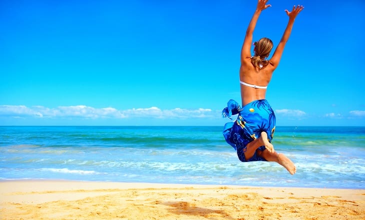 jumping at the beach