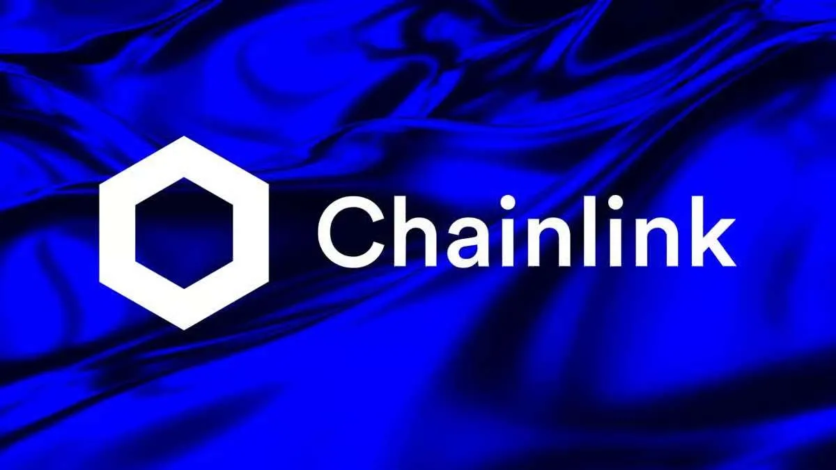 Chainlink logo with a white hexagon icon and the word 'Chainlink' on a bright blue, silky background.