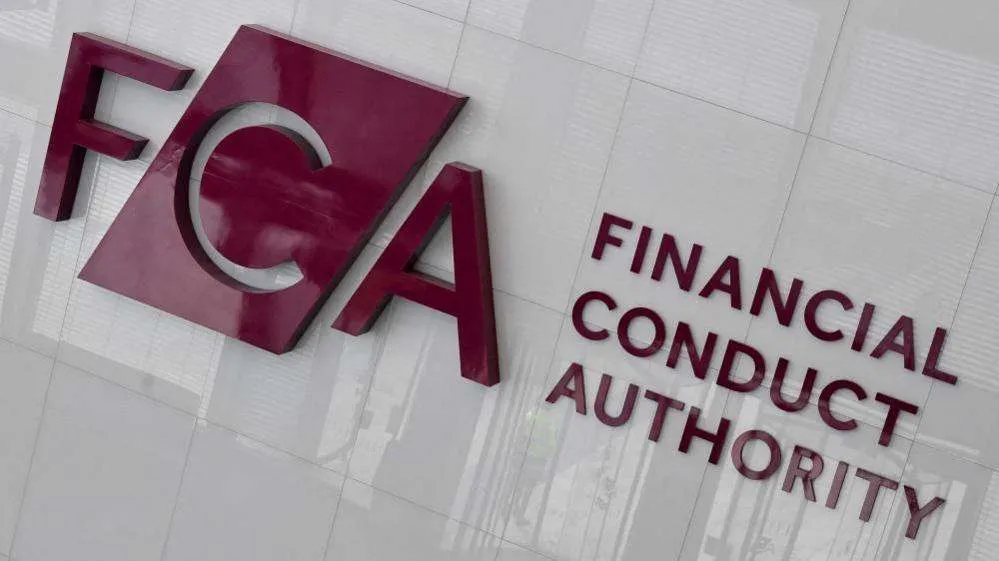 Sign for the Financial Conduct Authority (FCA) with large red FCA letters and 'Financial Conduct Authority' text on a glass-like wall.